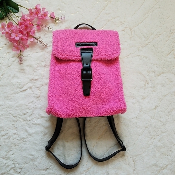 dr martens backpack mini Leather or stamp your individuality through bright colours and textured finishes Dr. Martens Mini Faux Shearling